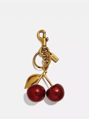 COACH Original Cherry Bag Charm in Gold